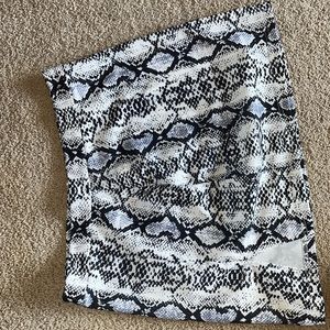 Snake skin skirt. smooth fabric size 24